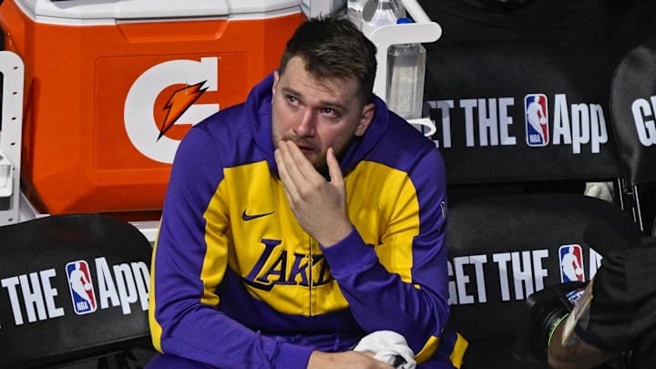 Apr 9, 2025; Dallas, Texas, USA; Los Angeles Lakers guard Luka Doncic (77) looks on as the Dallas Mavericks play a tribute video for Doncic before the game against the Lakers at the American Airlines Center. Mandatory Credit: Jerome Miron-Imagn Images Apr 9, 2025; Dallas, Texas, USA; Los Angeles Lakers guard Luka Doncic (77) looks on as the Dallas Mavericks play a tribute video for Doncic before the game against the Lakers at the American Airlines Center. Mandatory Credit: Jerome Miron-Imagn Images