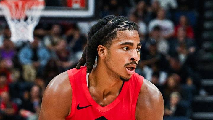 Toronto Raptors forward Collin Murray-Boyles dribbles the ball against Miami Heat center Nick Richards. Toronto Raptors forward Collin Murray-Boyles dribbles the ball against Miami Heat center Nick Richards.