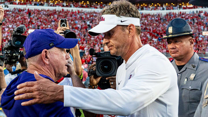 LSU head coach Brian Kelly and Ole Miss head coach Lane Kiffin shake hands after Ole Miss was defeated by LSU 24-19. LSU head coach Brian Kelly and Ole Miss head coach Lane Kiffin shake hands after Ole Miss was defeated by LSU 24-19.