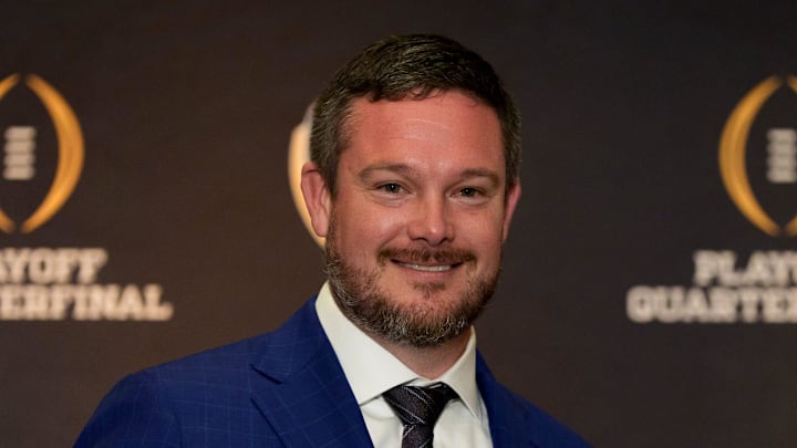 Oregon head coach Dan Lanning holds an orange during the head coaches press conference ahead of Orange Bowl on Dec. 31, 2025, in Dania Beach, Florida.