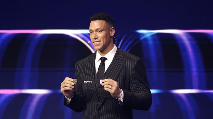 Dec 5, 2025; Washington, District of Columbia, USA; Aaron Judge draws the card of Egypt for Group G during the FIFA World Cup 2026 Final Draw at John F. Kennedy Center for the Performing Arts. Mandatory Credit: Amber Searls-Imagn Images