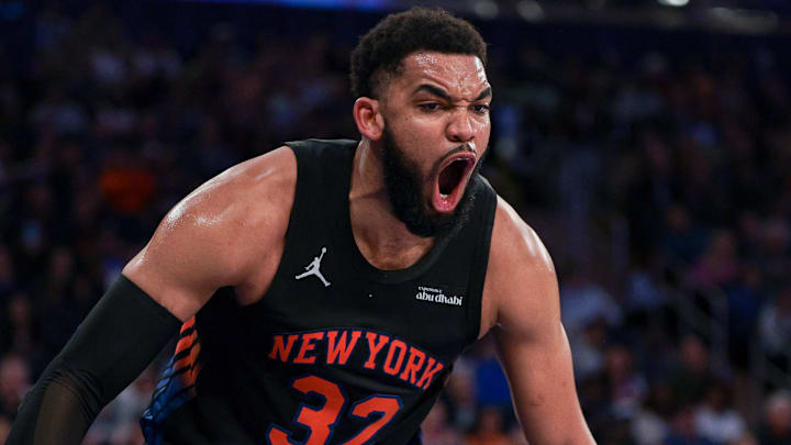 Apr 10, 2026; New York, New York, USA; New York Knicks center Karl-Anthony Towns (32) reacts after a dunk against the Toronto Raptors during the second half at Madison Square Garden. Mandatory Credit: Vincent Carchietta-Imagn Images 