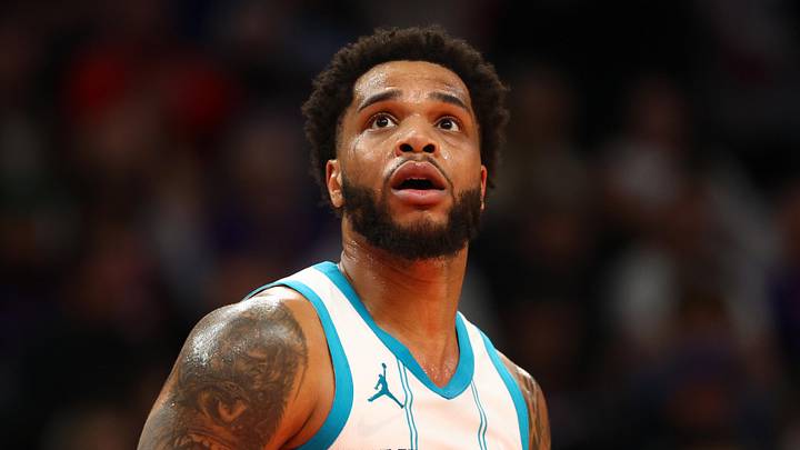 Jan 12, 2025; Phoenix, Arizona, USA; Charlotte Hornets forward Miles Bridges (0) against the Phoenix Suns at Footprint Center. Mandatory Credit: Mark J. Rebilas-Imagn Images