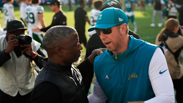 Jacksonville Jaguars head coach Liam Coen and New York Jets head coach Aaron Glenn greet after the game of an NFL football matchup at EverBank Stadium, Sunday, Dec. 14, 2025, in Jacksonville, Fla. The Jaguars defeated the Jets 48-20. [Corey Perrine/Florida Times-Union]