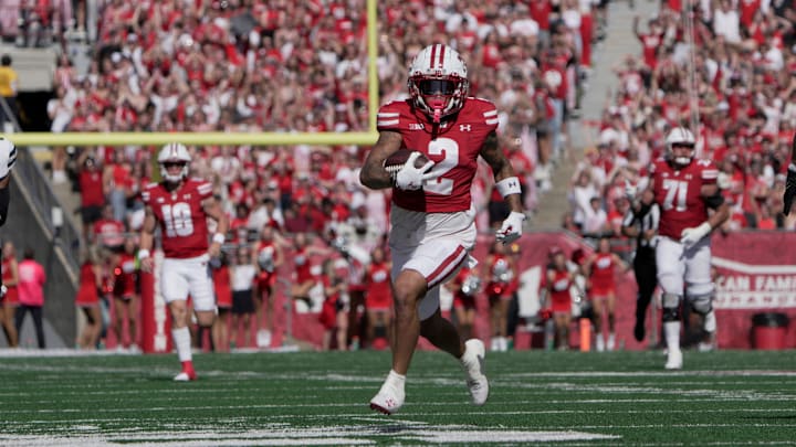 Wisconsin wide receiver Trech Kekahuna (2) scores a touchdown on a 69-yard reception during the third quarter of their game Saturday, October 5, 2024 at Camp Randall Stadium in Madison, Wisconsin. Wisconsin wide receiver Trech Kekahuna (2) scores a touchdown on a 69-yard reception during the third quarter of their game Saturday, October 5, 2024 at Camp Randall Stadium in Madison, Wisconsin.