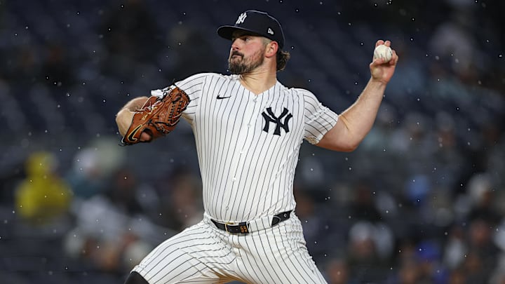 Apr 2, 2025; Bronx, New York, USA; New York Yankees starting pitcher Carlos Rodon (55) delivers a pitch during the first inning against the Arizona Diamondbacks at Yankee Stadium. 