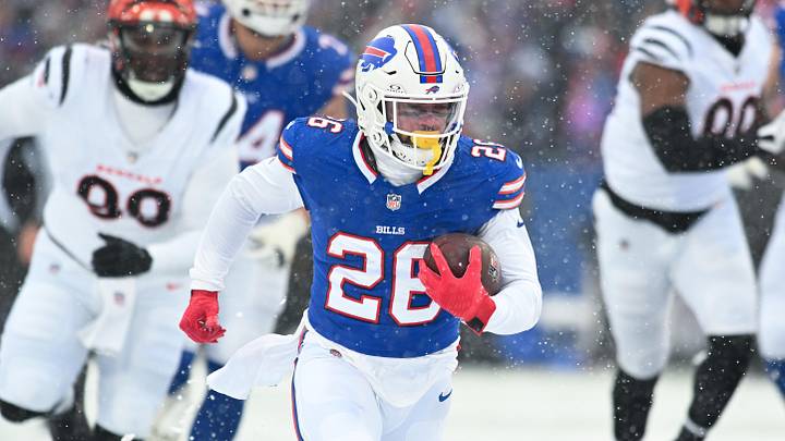 Dec 7, 2025; Orchard Park, New York, USA; Buffalo Bills running back Ty Johnson (26) runs with the ball in the first quarter against the Cincinnati Bengals at Highmark Stadium. Dec 7, 2025; Orchard Park, New York, USA; Buffalo Bills running back Ty Johnson (26) runs with the ball in the first quarter against the Cincinnati Bengals at Highmark Stadium.