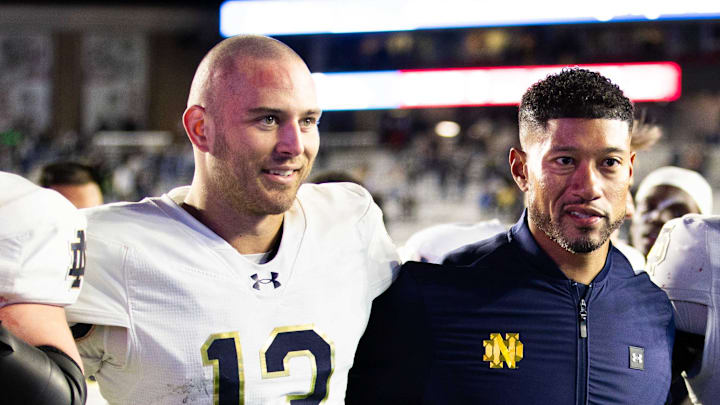 Nov 1, 2025; Chestnut Hill, Massachusetts, USA; Notre Dame Fighting Irish head coach Marcus Freeman, Notre Dame Fighting Irish quarterback CJ Carr (13) and Notre Dame Fighting Irish defensive lineman Donovan Hinish (41) after the game against the Boston College Eagles at Alumni Stadium. Nov 1, 2025; Chestnut Hill, Massachusetts, USA; Notre Dame Fighting Irish head coach Marcus Freeman, Notre Dame Fighting Irish quarterback CJ Carr (13) and Notre Dame Fighting Irish defensive lineman Donovan Hinish (41) after the game against the Boston College Eagles at Alumni Stadium.