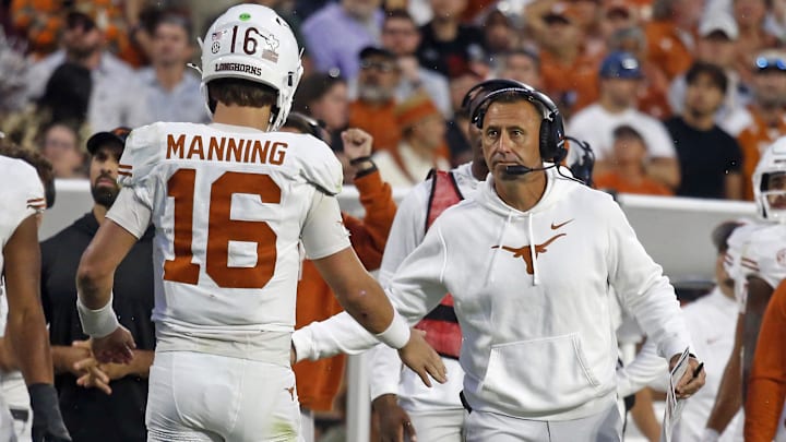Texas Longhorns head coach Steve Sarkisian reacts with Texas Longhorns quarterback Arch Manning during the fourth quarter against the Mississippi State Bulldogs at Davis Wade Stadium at Scott Field. 
