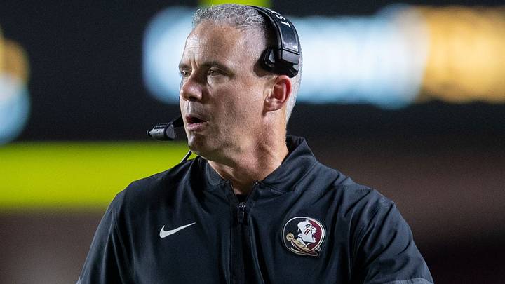 Florida State Seminoles head coach Mike Norvell talks into his headset during a timeout. The Florida State Seminoles defeated the New Mexico State Aggies 34-17 at Doak Campbell Stadium on Saturday, Aug. 29, 2026. Florida State Seminoles head coach Mike Norvell talks into his headset during a timeout. The Florida State Seminoles defeated the New Mexico State Aggies 34-17 at Doak Campbell Stadium on Saturday, Aug. 29, 2026.