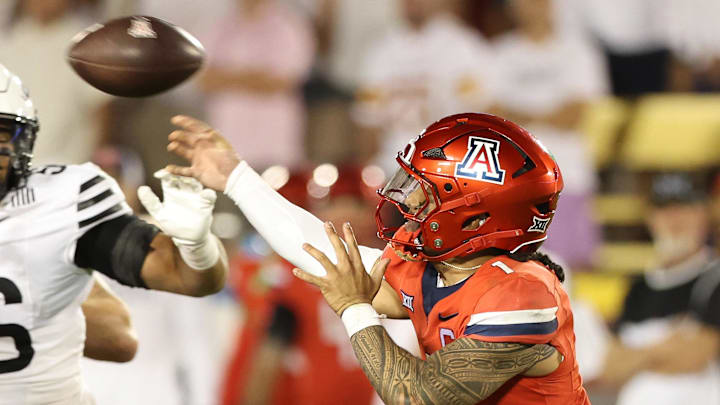Sep 27, 2025; Ames, Iowa, USA; Arizona Wildcats quarterback Noah Fifita (1) throws a pass against the Iowa State Cyclones during the second half at Jack Trice Stadium. Mandatory Credit: Reese Strickland-Imagn Images Sep 27, 2025; Ames, Iowa, USA; Arizona Wildcats quarterback Noah Fifita (1) throws a pass against the Iowa State Cyclones during the second half at Jack Trice Stadium. Mandatory Credit: Reese Strickland-Imagn Images