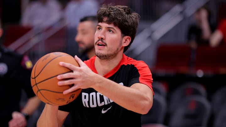 Oct 15, 2024; Houston, Texas, USA; Houston Rockets guard Reed Sheppard (15) warms up prior to the game against the New Orleans Pelicans at Toyota Center. Mandatory Credit: Erik Williams-Imagn Images

