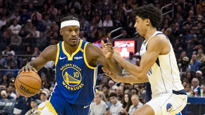Feb 23, 2025; San Francisco, California, USA; Golden State Warriors forward Jimmy Butler III (10) drives past Dallas Mavericks guard Max Christie (00) during the third quarter at Chase Center. Mandatory Credit: John Hefti-Imagn Images Feb 23, 2025; San Francisco, California, USA; Golden State Warriors forward Jimmy Butler III (10) drives past Dallas Mavericks guard Max Christie (00) during the third quarter at Chase Center. Mandatory Credit: John Hefti-Imagn Images