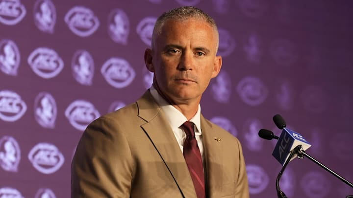 Jul 22, 2024; Charlotte, NC, USA; Florida State head coach Mike Norvell speaks to the media during ACC Kickoff at Hilton Charlotte Uptown. Mandatory Credit: Jim Dedmon-Imagn Images