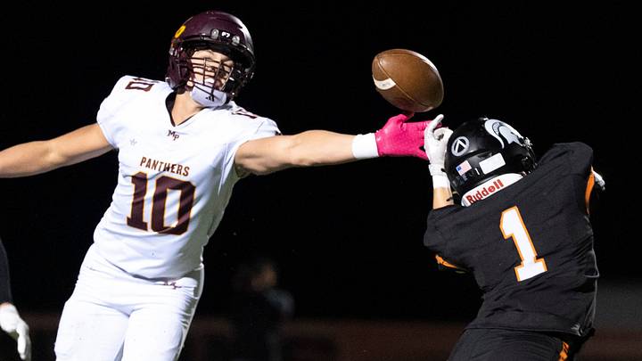 Solon’s Wyatt Young (1) breaks up a pass meant for Mount Pleasant’s Brody Clark (10) Oct. 16, 2026 during a high school football game at Solon High School in Solon, Iowa.
