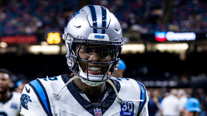 Sep 8, 2024; New Orleans, Louisiana, USA;  Carolina Panthers cornerback Lonnie Johnson Jr. (32) walks off the field before the game against the New Orleans Saints  at Caesars Superdome. Mandatory Credit: Stephen Lew-Imagn Images