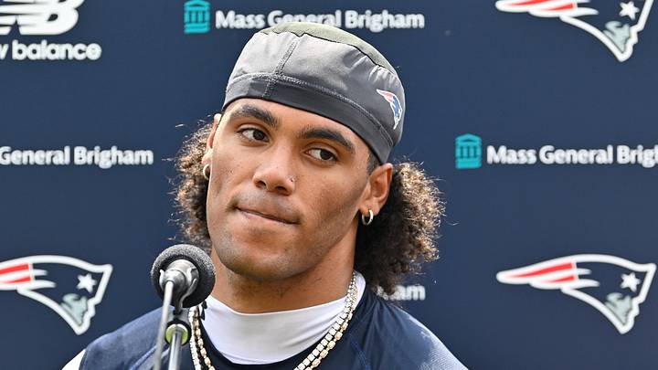 New England Patriots cornerback Christian Gonzalez (0).