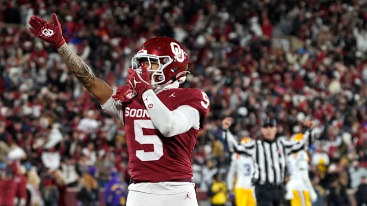 Oklahoma receiver Isaiah Sategna celebrates his go-ahead touchdown against LSU.