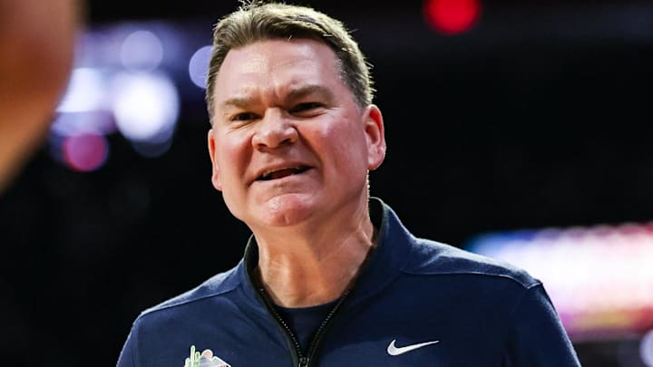 Jan 21, 2026; Tucson, Arizona, USA; Arizona Wildcats head coach Tommy Lloyd yells out towards the referee during the second half of the game at McKale Memorial Center. Mandatory Credit: Aryanna Frank-Imagn Images