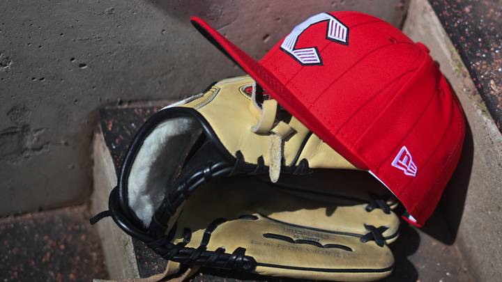 Apr 11, 2026; Cincinnati, Ohio, USA; A view of an official Cincinnati Reds hat on the dugout steps during the game against the Los Angeles Angels at Great American Ball Park. Mandatory Credit: Aaron Doster-Imagn Images Apr 11, 2026; Cincinnati, Ohio, USA; A view of an official Cincinnati Reds hat on the dugout steps during the game against the Los Angeles Angels at Great American Ball Park. Mandatory Credit: Aaron Doster-Imagn Images