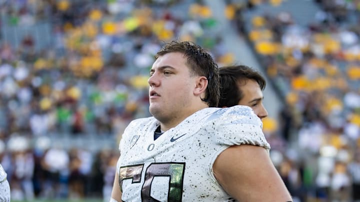 Nov 18, 2023; Tempe, Arizona, USA; Oregon Ducks offensive lineman Jackson Powers-Johnson (58) against the Arizona State Sun Devils at Mountain America Stadium. Mandatory Credit: Mark J. Rebilas-Imagn Images