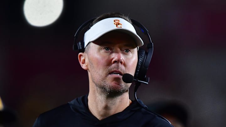 Nov 7, 2025; Los Angeles, California, USA; Southern California Trojans head coach Lincoln Riley watches game action against the Northwestern Wildcats during the second half at the Los Angeles Memorial Coliseum. Mandatory Credit: Gary A. Vasquez-Imagn Images Nov 7, 2025; Los Angeles, California, USA; Southern California Trojans head coach Lincoln Riley watches game action against the Northwestern Wildcats during the second half at the Los Angeles Memorial Coliseum. Mandatory Credit: Gary A. Vasquez-Imagn Images