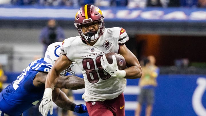 Oct 30, 2022; Indianapolis, Indiana, USA; Washington Commanders tight end Armani Rogers (88) runs with the ball while Indianapolis Colts running back Nyheim Hines (21) defends in the second half at Lucas Oil Stadium. Mandatory Credit: Trevor Ruszkowski-USA TODAY Sports Oct 30, 2022; Indianapolis, Indiana, USA; Washington Commanders tight end Armani Rogers (88) runs with the ball while Indianapolis Colts running back Nyheim Hines (21) defends in the second half at Lucas Oil Stadium. Mandatory Credit: Trevor Ruszkowski-USA TODAY Sports