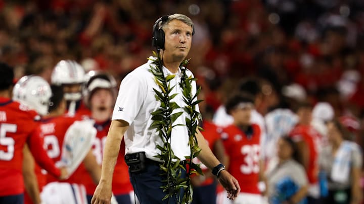 Sep 7, 2024; Tucson, Arizona, USA; Arizona Wildcats head coach Brent Brennan looks at score board against the Northern Arizona Lumberjacks during first quarter at Arizona Stadium. Mandatory Credit: Aryanna Frank-Imagn Images Sep 7, 2024; Tucson, Arizona, USA; Arizona Wildcats head coach Brent Brennan looks at score board against the Northern Arizona Lumberjacks during first quarter at Arizona Stadium. Mandatory Credit: Aryanna Frank-Imagn Images