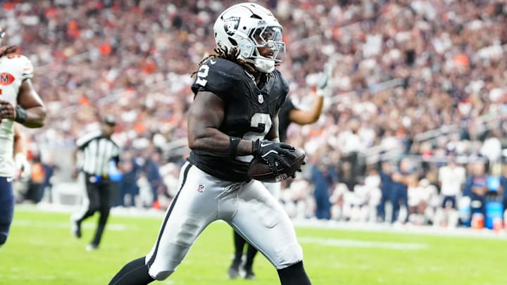 Sep 28, 2025; Paradise, Nevada, USA; Las Vegas Raiders running back Ashton Jeanty (2) runs the ball for a touchdown during the second half against the Chicago Bears at Allegiant Stadium. Mandatory Credit: Stephen R. Sylvanie-Imagn Images