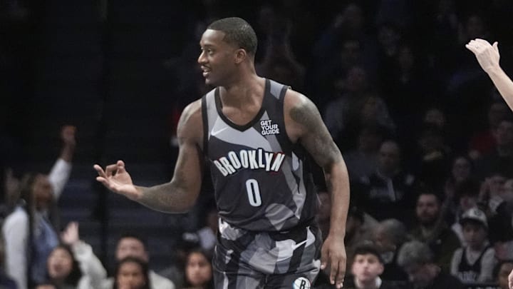 Apr 6, 2025; Brooklyn, New York, USA; Brooklyn Nets forward Dariq Whitehead (0) reacts to making a three point shot against the Toronto Raptors during the first half at Barclays Center. Mandatory Credit: Gregory Fisher-Imagn Images