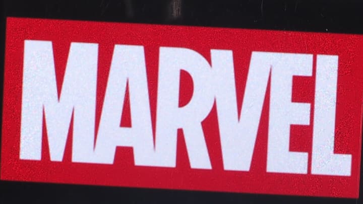 In this photo illustration, Marvel Entertainment logo seen...