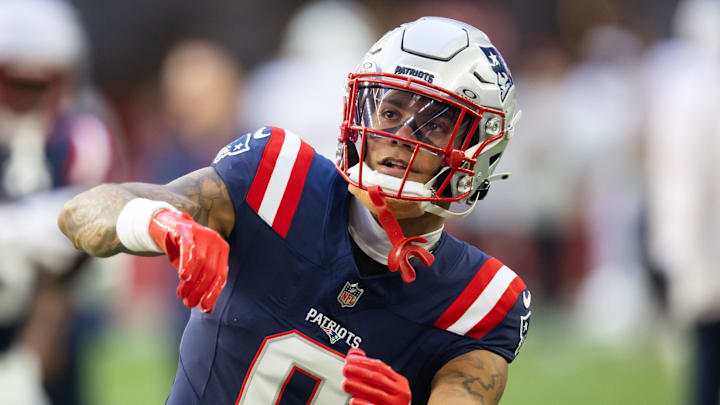 Dec 15, 2024; Glendale, Arizona, USA; New England Patriots cornerback Christian Gonzalez (0) against the Arizona Cardinals at State Farm Stadium. Mandatory Credit: Mark J. Rebilas-Imagn Images