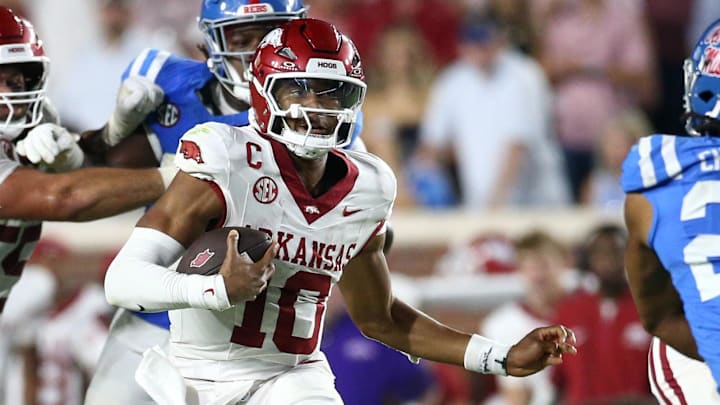 Arkansas Razorbacks quarterback Taylen Green (10) runs the ball during the fourth quarter against the Ole Miss Rebels at Vaught-Hemingway Stadium. Arkansas Razorbacks quarterback Taylen Green (10) runs the ball during the fourth quarter against the Ole Miss Rebels at Vaught-Hemingway Stadium.