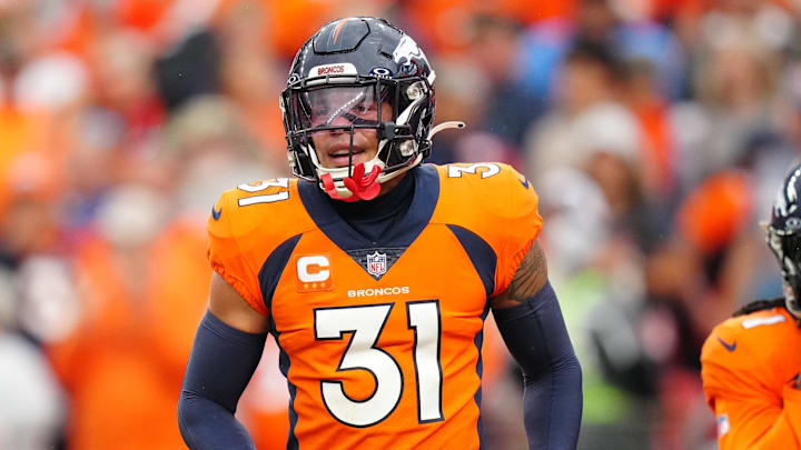 Sep 10, 2023; Denver, Colorado, USA; Denver Broncos safety Justin Simmons (31) reacts to a turnover