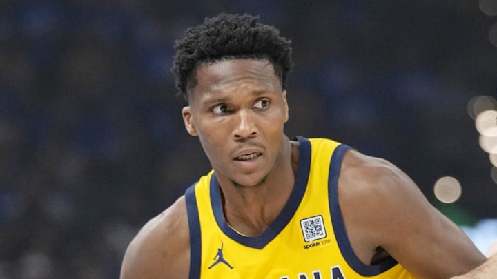 Jun 22, 2025; Oklahoma City, Oklahoma, USA; Indiana Pacers guard Bennedict Mathurin (00) dribbles the ball against Oklahoma City Thunder guard Alex Caruso (9) during the first half of game seven of the 2025 NBA Finals at Paycom Center. Mandatory Credit: Kyle Terada-Imagn Images Jun 22, 2025; Oklahoma City, Oklahoma, USA; Indiana Pacers guard Bennedict Mathurin (00) dribbles the ball against Oklahoma City Thunder guard Alex Caruso (9) during the first half of game seven of the 2025 NBA Finals at Paycom Center. Mandatory Credit: Kyle Terada-Imagn Images
