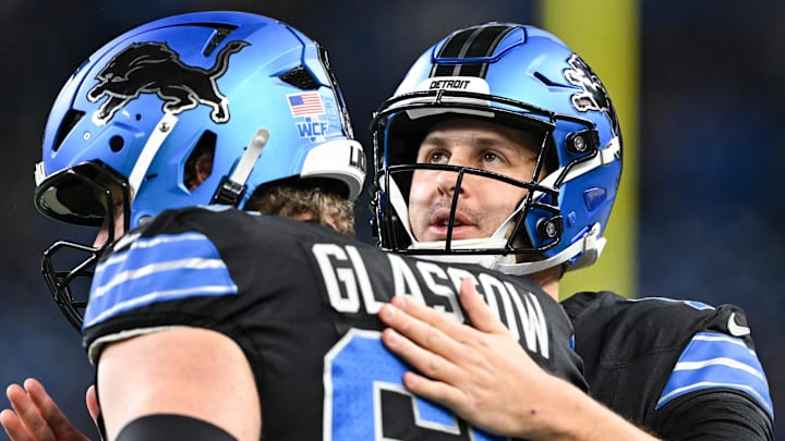 Detroit Lions quarterback Jared Goff (16) greets offensive linemen Graham Glasgow (60) before the game against Giants