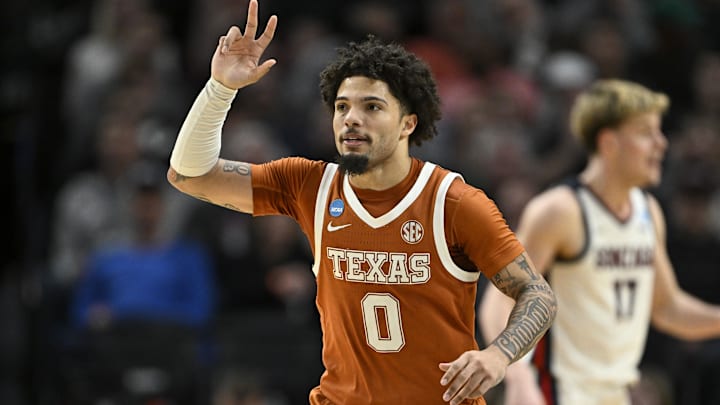 Texas Longhorns guard Jordan Pope reacts after a basket in the second half against the Gonzaga Bulldogs during a second round game of the men's 2026 NCAA Tournament at Moda Center. 