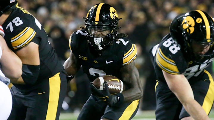 Iowa running back Kaleb Johnson (2) carries the ball against Wisconsin Saturday, Nov. 2, 2024 at Kinnick Stadium in Iowa City, Iowa.