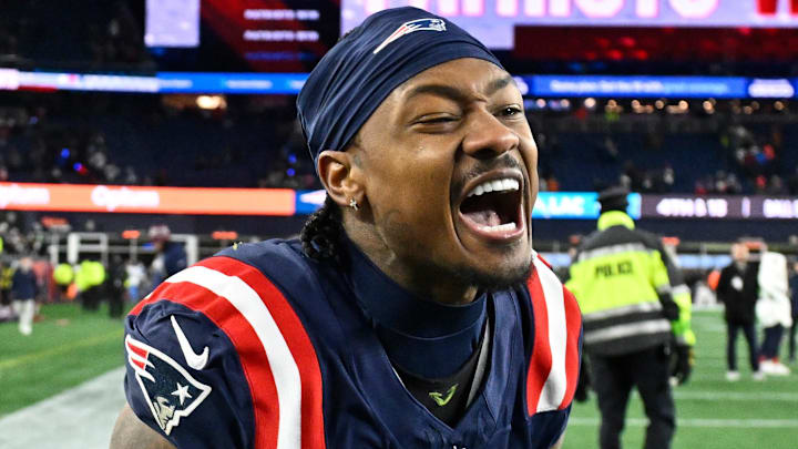 Jan 11, 2026; Foxborough, MA, USA; New England Patriots wide receiver Stefon Diggs (8) reacts after defeating the Los Angeles Chargers in an AFC Wild Card Round game at Gillette Stadium. Mandatory Credit: Eric Canha-Imagn Images