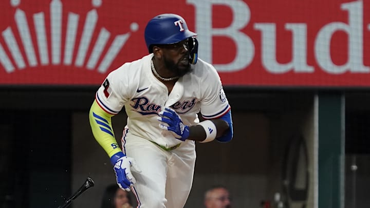 Jun 18, 2025; Arlington, Texas, USA; Texas Rangers outfielder Adolis García (53) hits an RBI single during the first inning against the Kansas City Royals at Globe Life Field.