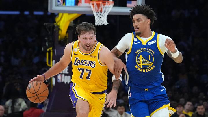 Oct 21, 2026; Los Angeles, California, USA; Los Angeles Lakers guard Luka Doncic (77) drives to the basket against Golden State Warriors forward Yaxel Lendeborg (1) in the first half at Crypto.com Arena. Mandatory Credit: Kirby Lee-Imagn Images Oct 21, 2026; Los Angeles, California, USA; Los Angeles Lakers guard Luka Doncic (77) drives to the basket against Golden State Warriors forward Yaxel Lendeborg (1) in the first half at Crypto.com Arena. Mandatory Credit: Kirby Lee-Imagn Images