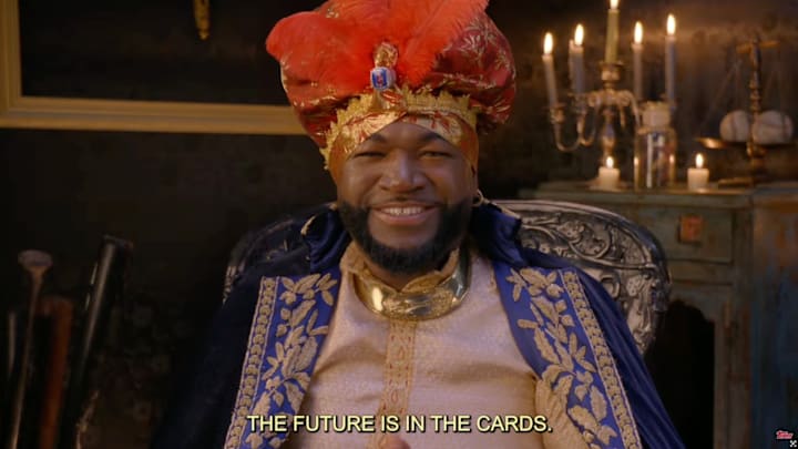 Ortiz plays the role of a tarot card reader in a new commercial for Topps and Bowman.