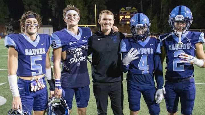 Saugus High football community is rallying around assistant coach Scott Maxwell (middle) in his battle against cancer.