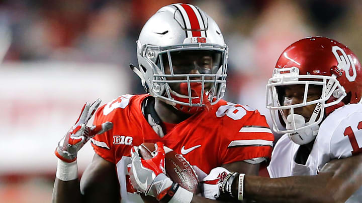 Sep 9, 2017; Columbus, OH, USA; Ohio State Buckeyes wide receiver Terry McLaurin (83) tackled by Oklahoma Sooners cornerback Parnell Motley (11) at Ohio Stadium. The Oklahoma Sooners won the game 31-16. Mandatory Credit: Joe Maiorana-Imagn Images