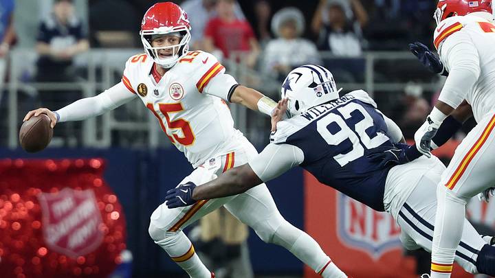 Kansas City Chiefs quarterback Patrick Mahomes runs with the ball against Dallas Cowboys defensive tackle Quinnen Williams. Kansas City Chiefs quarterback Patrick Mahomes runs with the ball against Dallas Cowboys defensive tackle Quinnen Williams.
