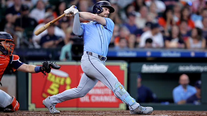 Aug 4, 2024; Houston, Texas, USA; Tampa Bay Rays second baseman Brandon Lowe (8) hits an RBI double against the Houston Astros during the third inning at Minute Maid Park. Aug 4, 2024; Houston, Texas, USA; Tampa Bay Rays second baseman Brandon Lowe (8) hits an RBI double against the Houston Astros during the third inning at Minute Maid Park.