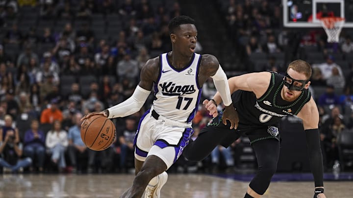 Nov 9, 2025; Sacramento, California, USA;  Sacramento Kings guard Dennis Schroder (17) dribbles the ball against Minnesota Timberwolves guard Donte DiVincenzo (0) during the first quarter at Golden 1 Center. Mandatory Credit: Justine Willard-Imagn Images