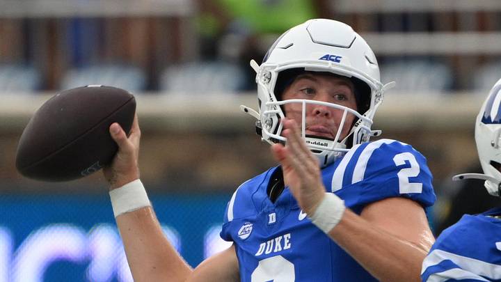 Sep 5, 2026; Durham, North Carolina, USA; Duke Blue Devils quarter back Walker Eget (2) brings the ball back while Duke Blue Devils offensive lineman Bradley Smith (63) blocks Tulane Green Wave defensive lineman Derrick Shepard Jr. (94) during the first quarter at Wallace Wade Stadium. Mandatory Credit: Zachary Taft-Imagn Images Sep 5, 2026; Durham, North Carolina, USA; Duke Blue Devils quarter back Walker Eget (2) brings the ball back while Duke Blue Devils offensive lineman Bradley Smith (63) blocks Tulane Green Wave defensive lineman Derrick Shepard Jr. (94) during the first quarter at Wallace Wade Stadium. Mandatory Credit: Zachary Taft-Imagn Images