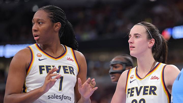 Aliyah Boston and Caitlin Clark react during an Indiana Fever game. Aliyah Boston and Caitlin Clark react during an Indiana Fever game.