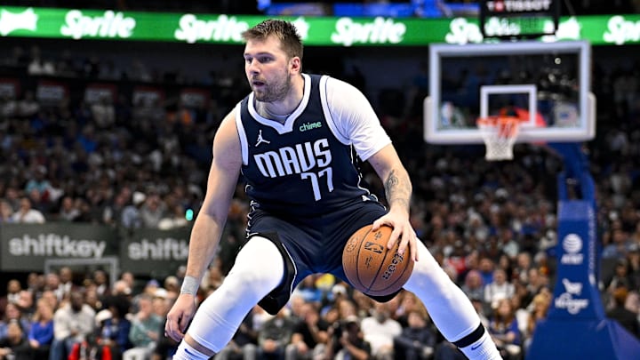 Nov 19, 2024; Dallas, Texas, USA; Dallas Mavericks guard Luka Doncic (77) brings the ball up court against the New Orleans Pelicans during the second half at the American Airlines Center. Mandatory Credit: Jerome Miron-Imagn Images